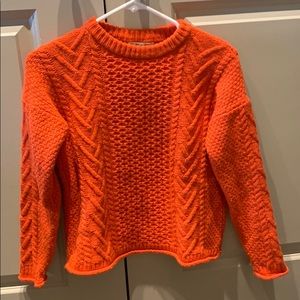 Red cable knit sweater